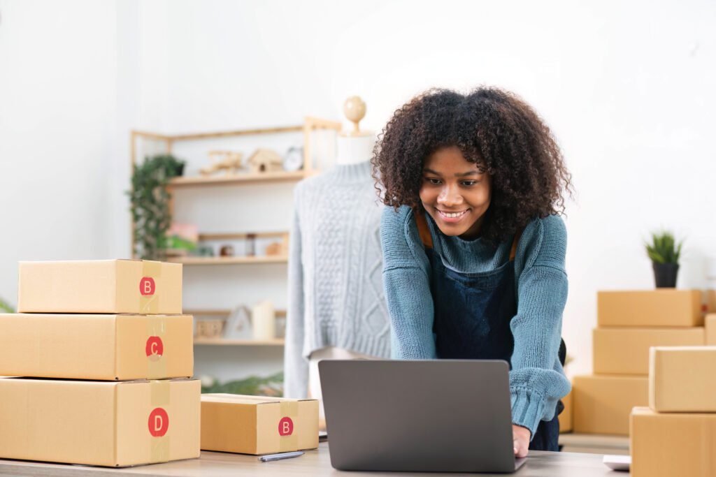 young smiling woman starting up her new online store